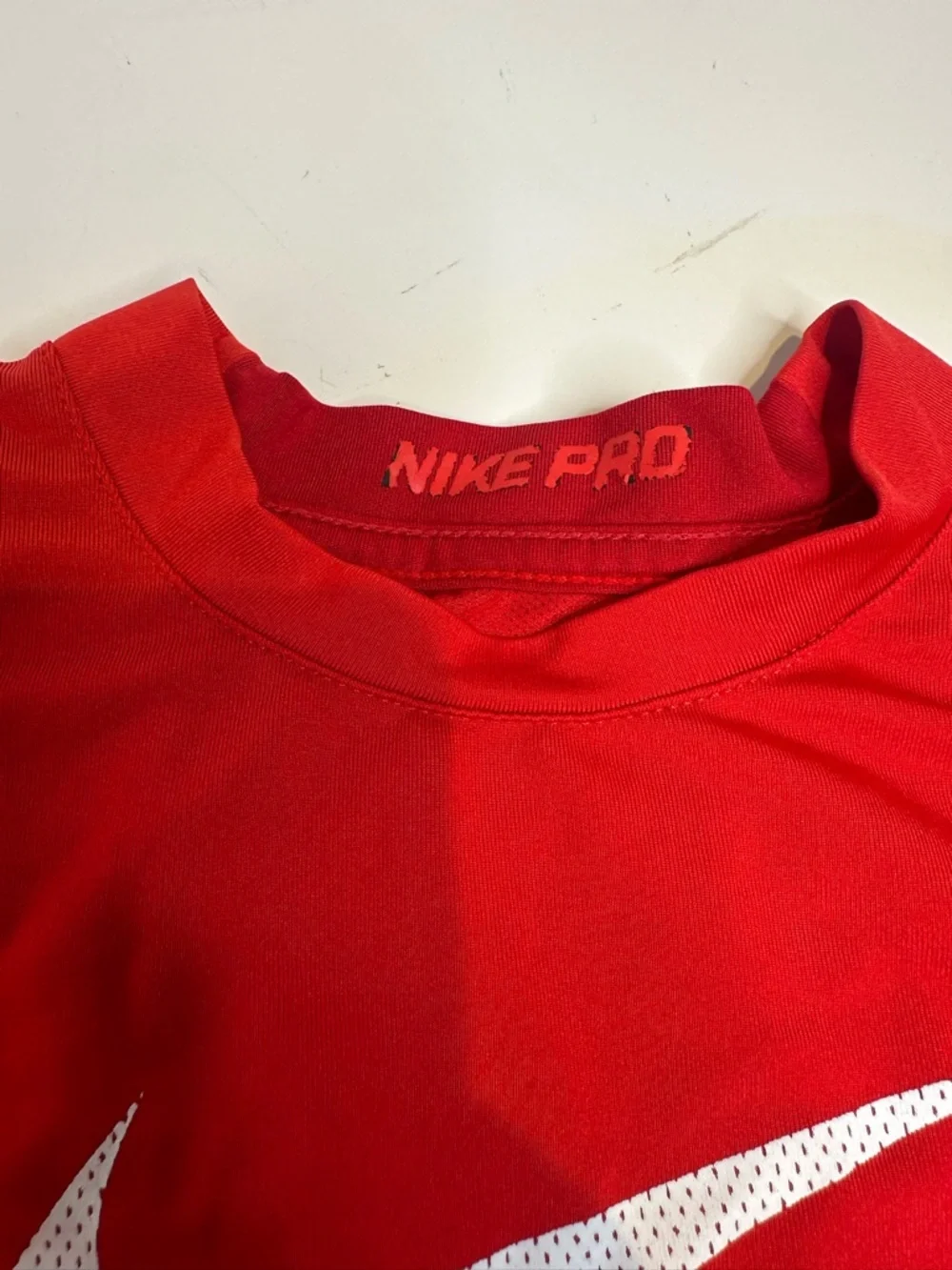 Nike Red Performance Long Sleeve Top with White Tag Detail